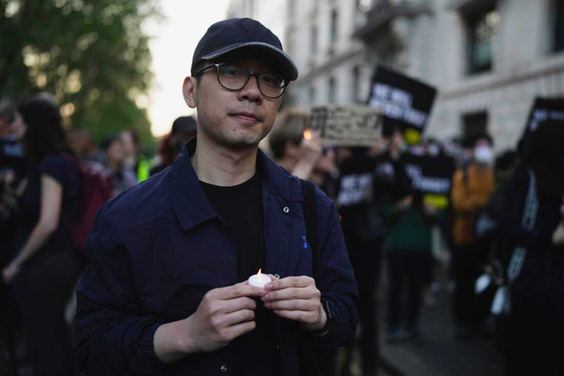 FILE - Hong Kong activist Nathan Law attends a candlelight vigil outside the Chinese Embassy in London on June 4, 2023, to mark the anniversary of China's bloody 1989 crackdown on pro-democracy protests in Beijing's Tiananmen Square.