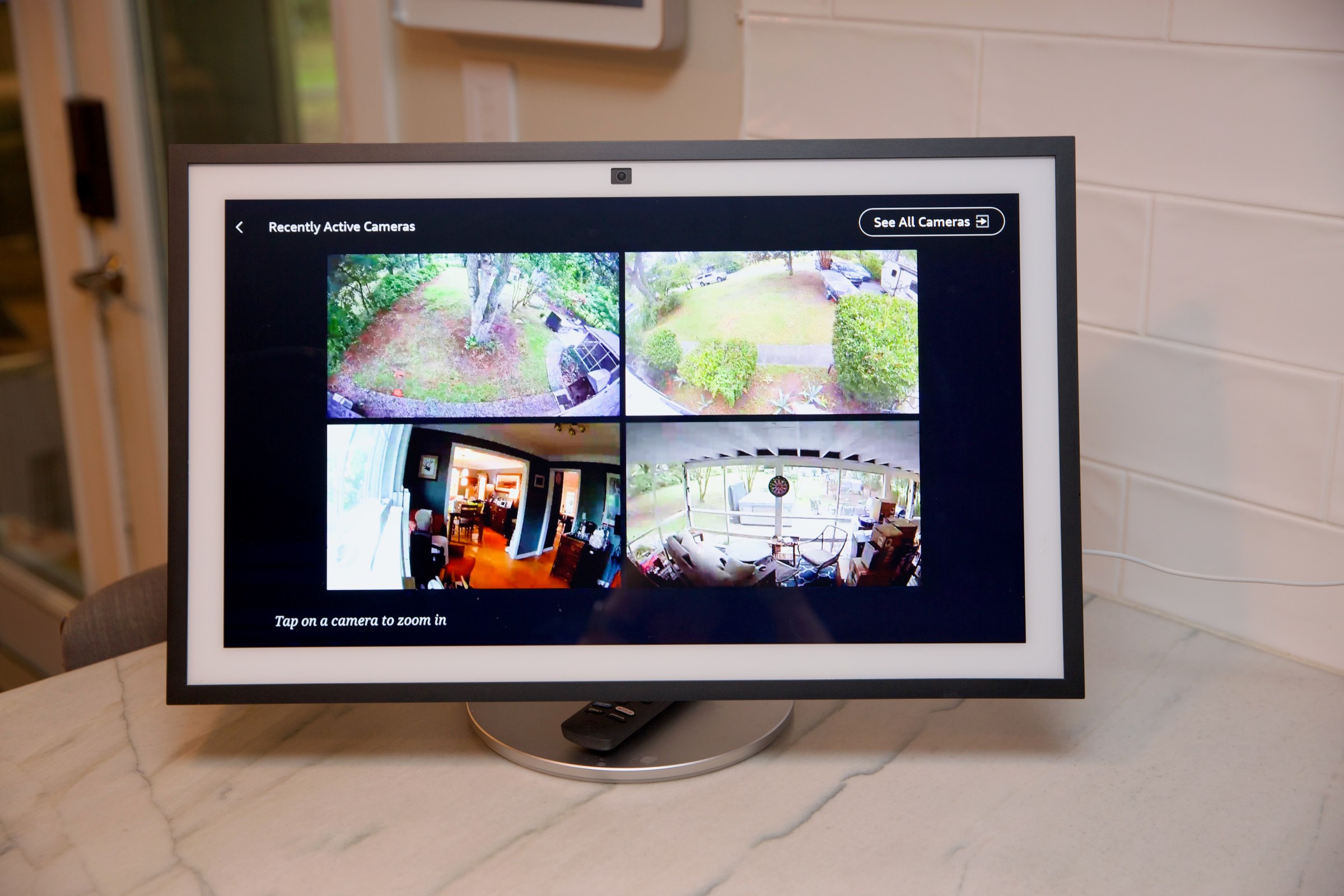 The Echo Show 21 can display live feeds from up to four Ring cameras, as well as pull up specific events using voice commands.