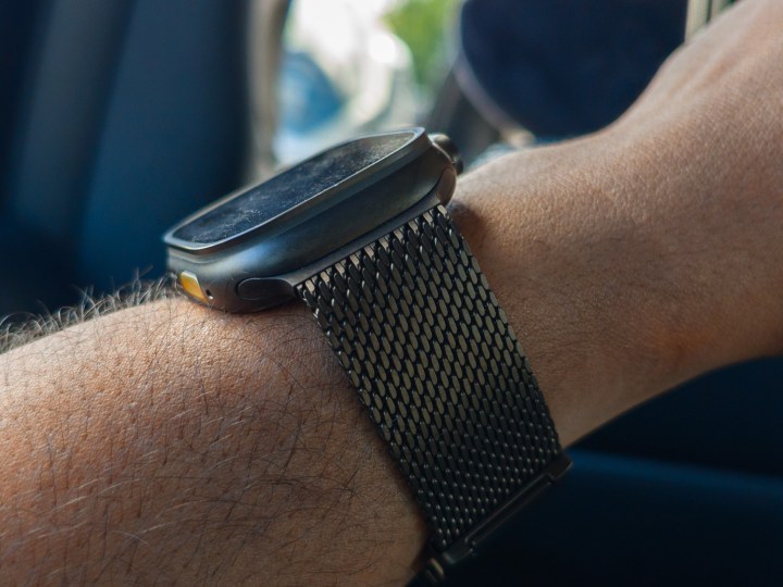 Apple Watch Ultra 3 in black titanium on a hand