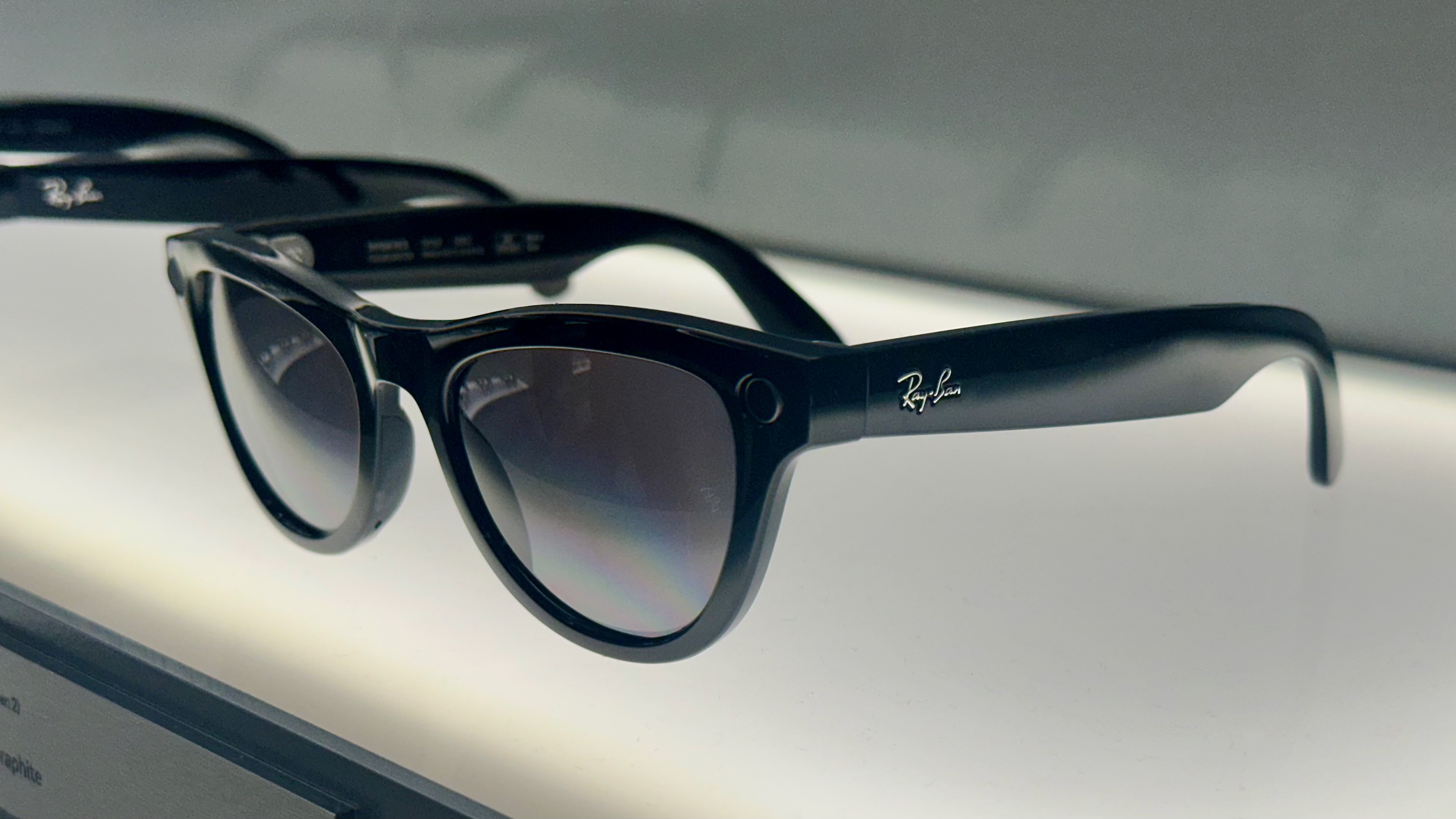 Graphite Ray-Ban Meta (Gen 2) glasses on display from a side view