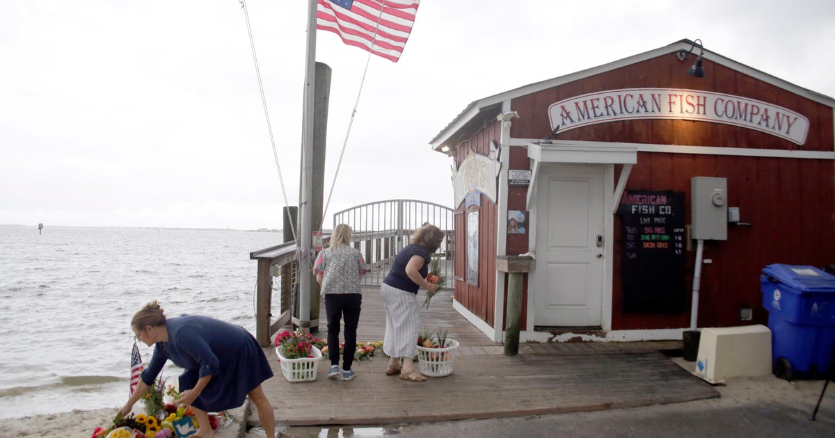 Man charged with killing 3 at waterfront North Carolina bar is decorated Marine veteran and Purple Heart recipient