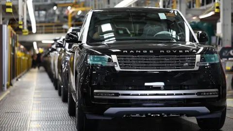 Getty Images A black Range Rover on a car production line