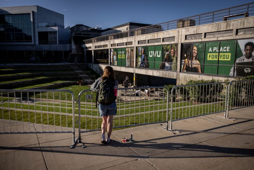 A person looked over the Utah Valley University courtyard where political activist Charlie Kirk was shot.