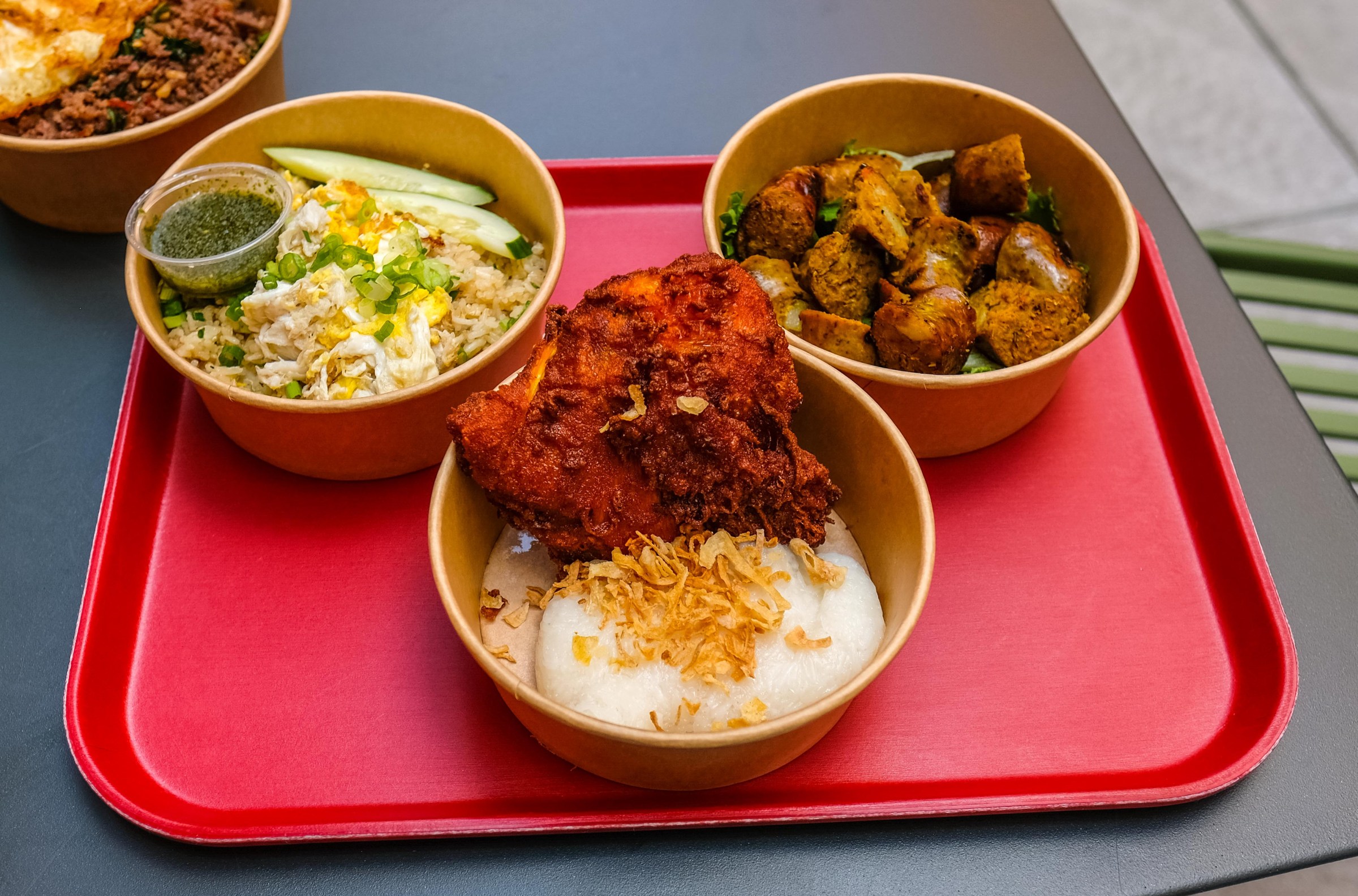 Crab fried rice, Northern Thai sausage, and hat yai fried chicken from Kam Rai Thai.