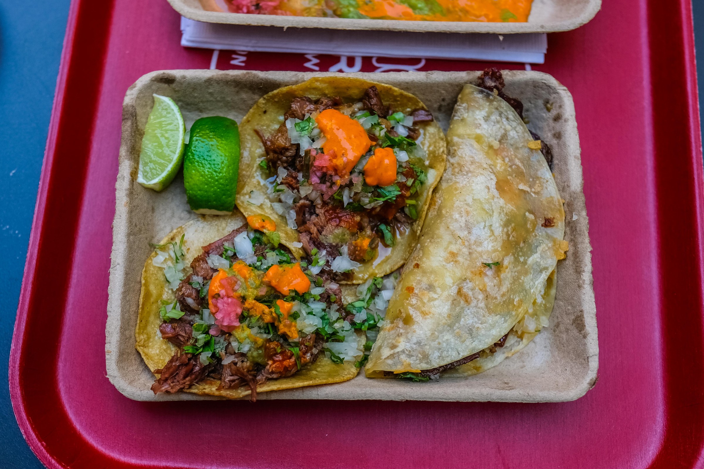 Suadero and tripa tacos and a carne quesadilla from Taqueria el Chato.